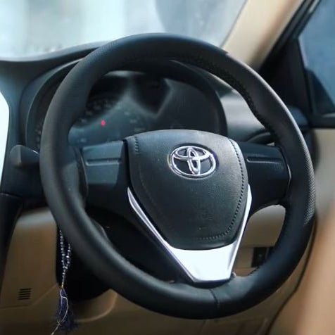 Steering wheel cover fitted inside a car